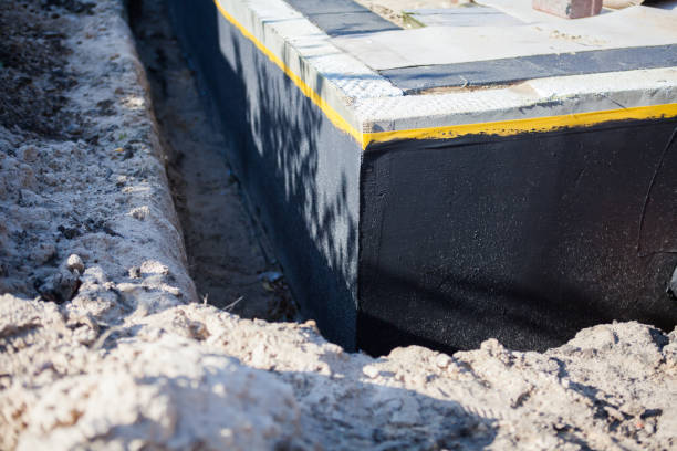 Professional Emergency Waterproofing technician working in Munford, TN